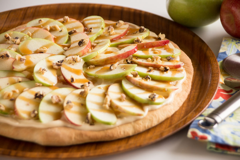 This delicious sweet pizza is the perfect combination of sweet and tangy with the wonderful apple slices.