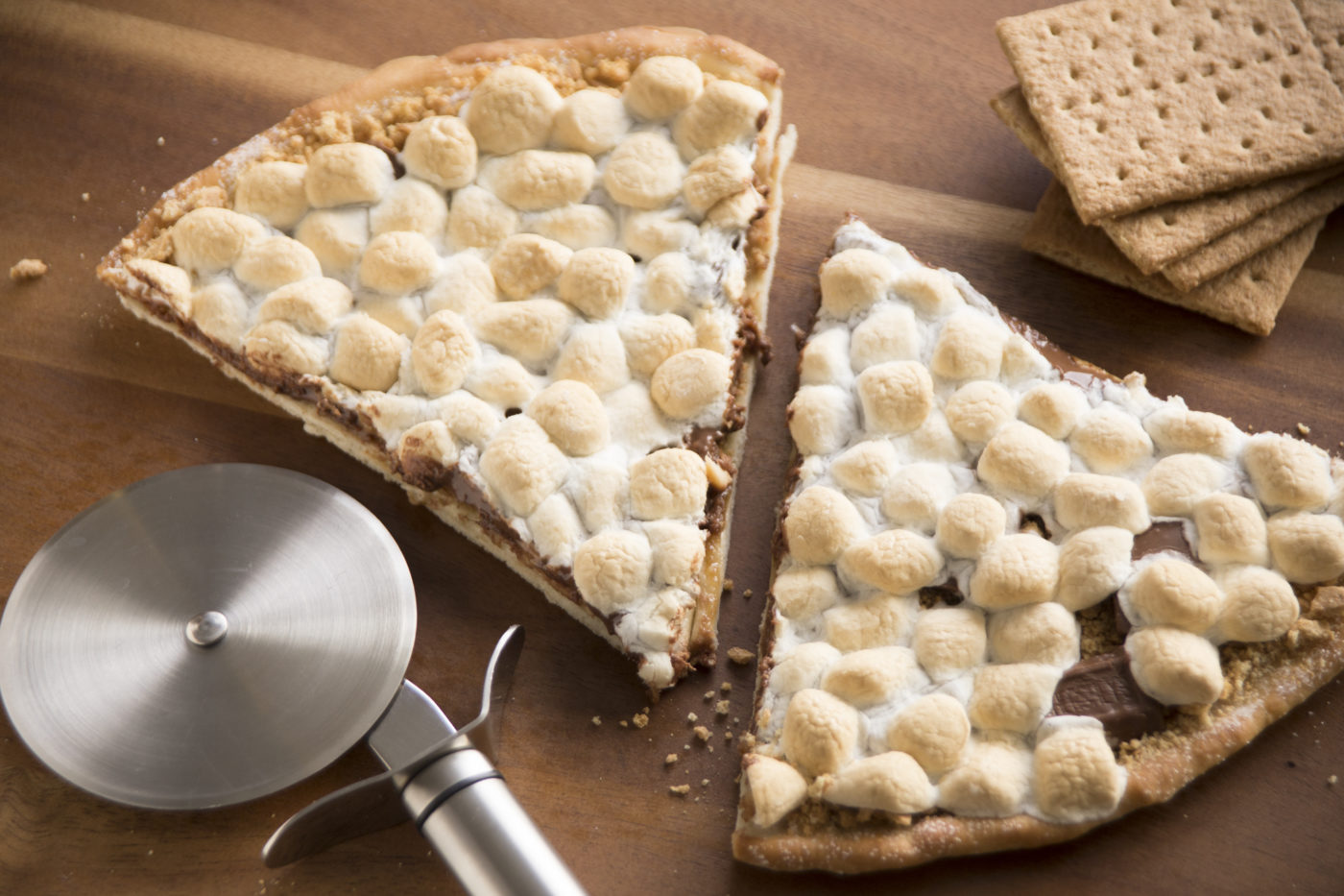 Delicious Dessert! Now get both S'Mores Dessert Pizza and Cinnamon Wheels  for AED 39 only. Use code: DD39 #dessertpizza #smoresdessert…