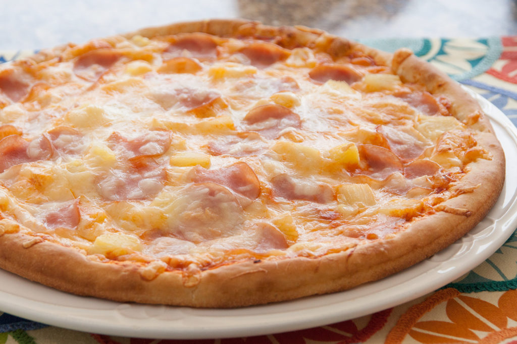 Canadian bacon and pineapple make this a great traditional Hawaiian Pizza.