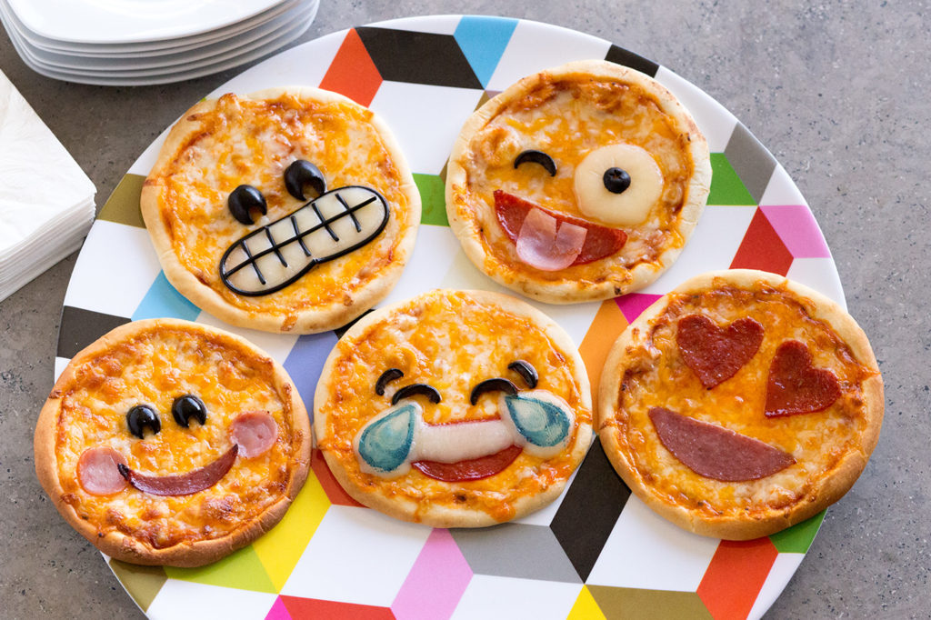 Be the hit of the day with these fun Emoji Pizzas!