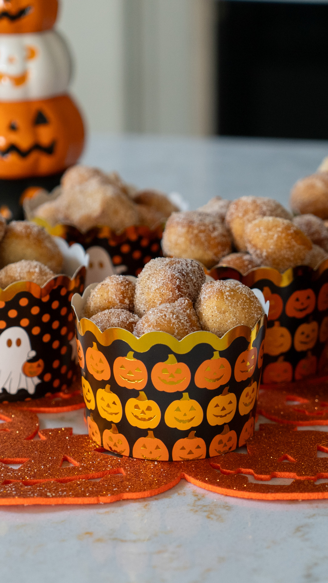 Pumpkin Spice Donut Holes in halloween serving cups.