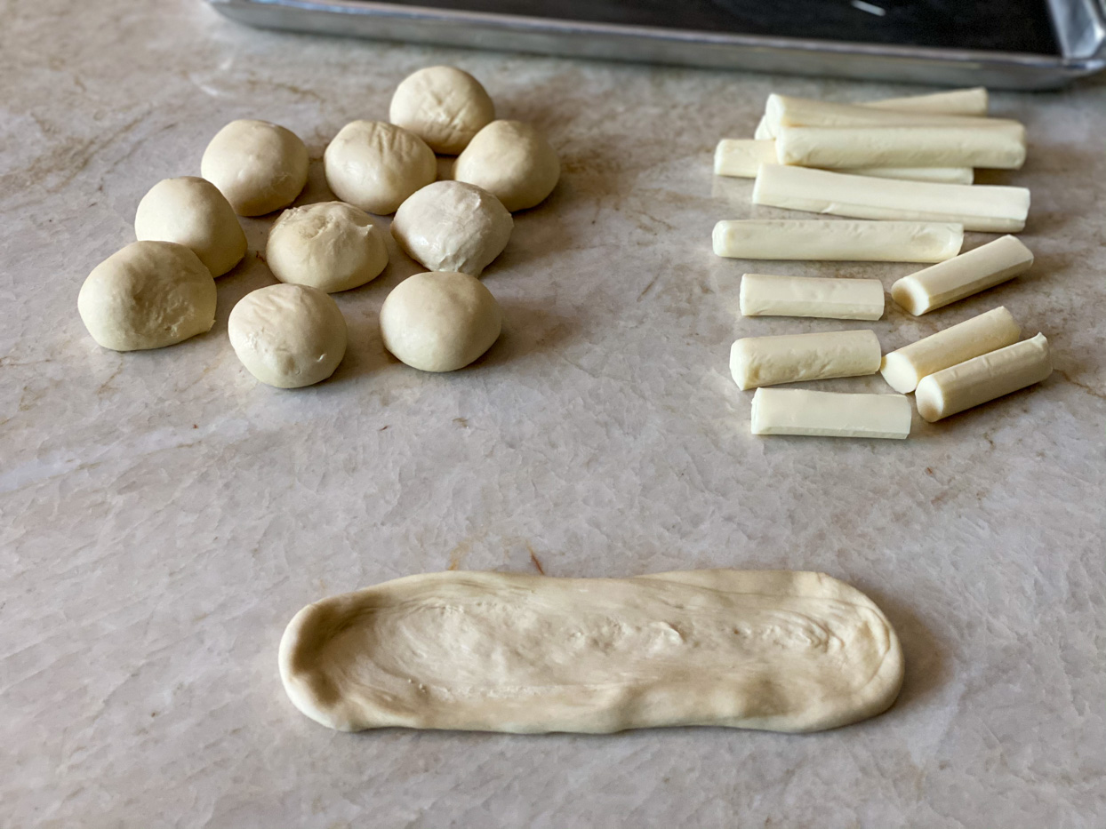 Dough rolled flat and long.