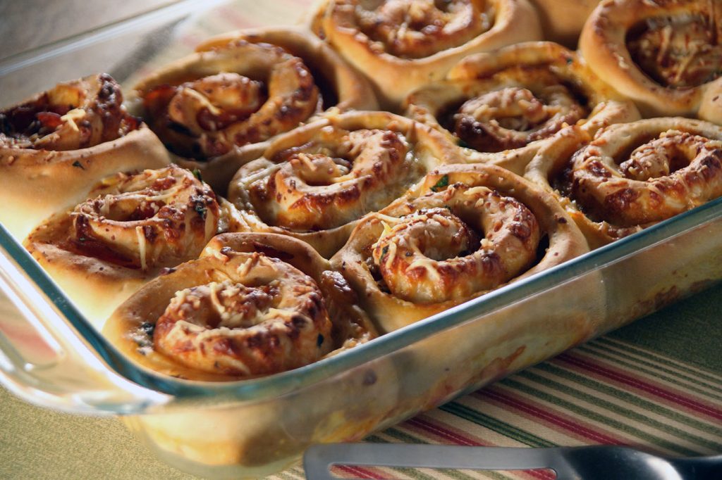 Pizza flavored swirl rolls, so simple to make and a fun twist for pizza night!