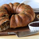 Thanksgiving Leftover Ring served with cranberry sauce and gravy