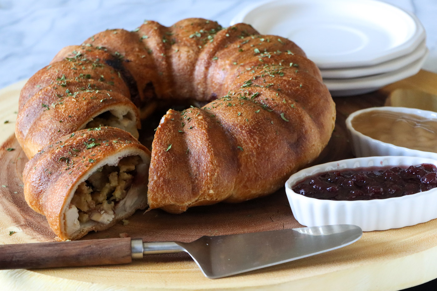 Thanksgiving Leftover Ring served with cranberry sauce and gravy