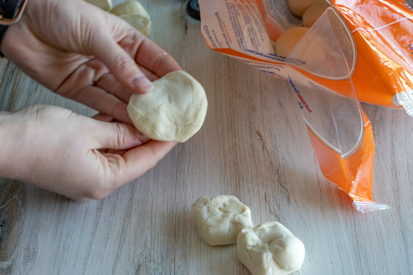 Flattened dinner roll dough.