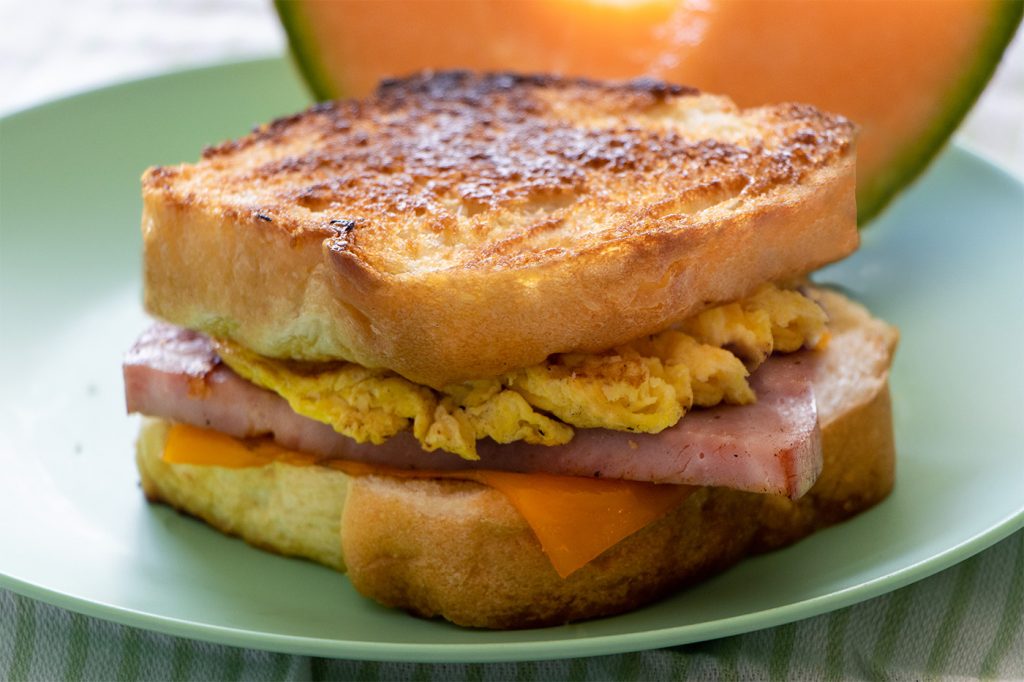 Slice your bread and heat your flat top griddle for this breakfast sandwich.