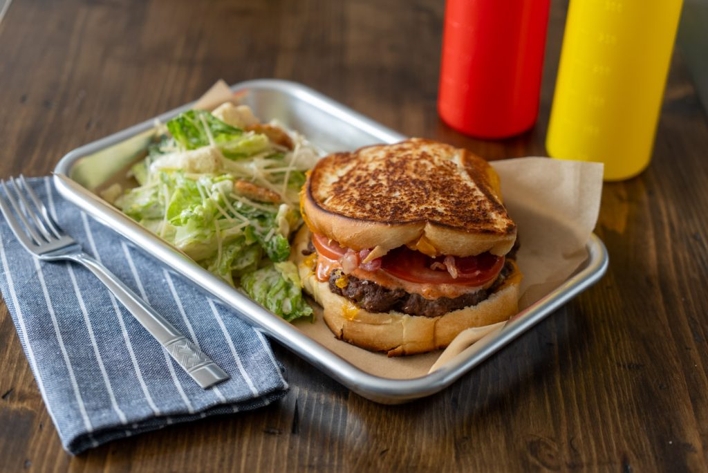 Grilled cheese meets smash burger will make the ultimate patty melt for your summer barbeques.